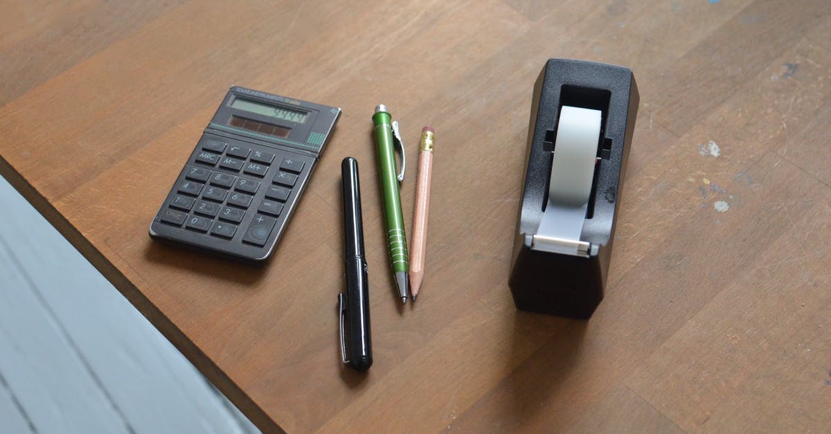 Can I bring my personal electronic items to US? - Stationary on brown office table