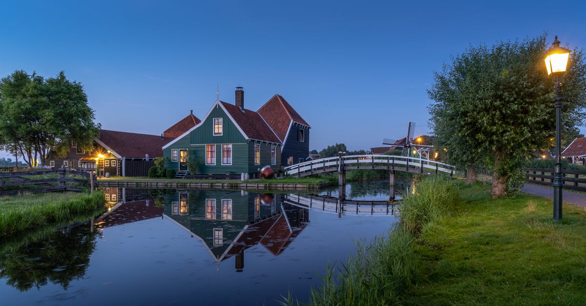 Can I bring old Dutch cheese to Canada? - Brown and White House Beside Body of Water