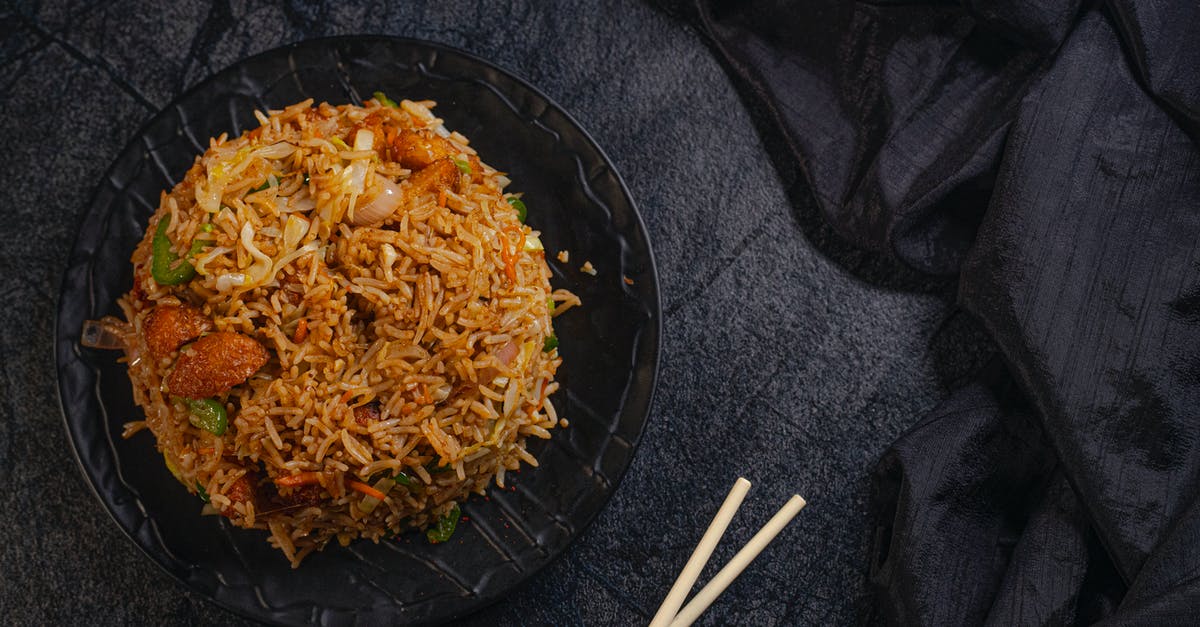 Can I carry fried rice and dried chicken preparation? - Appetizing Asian dish with rice