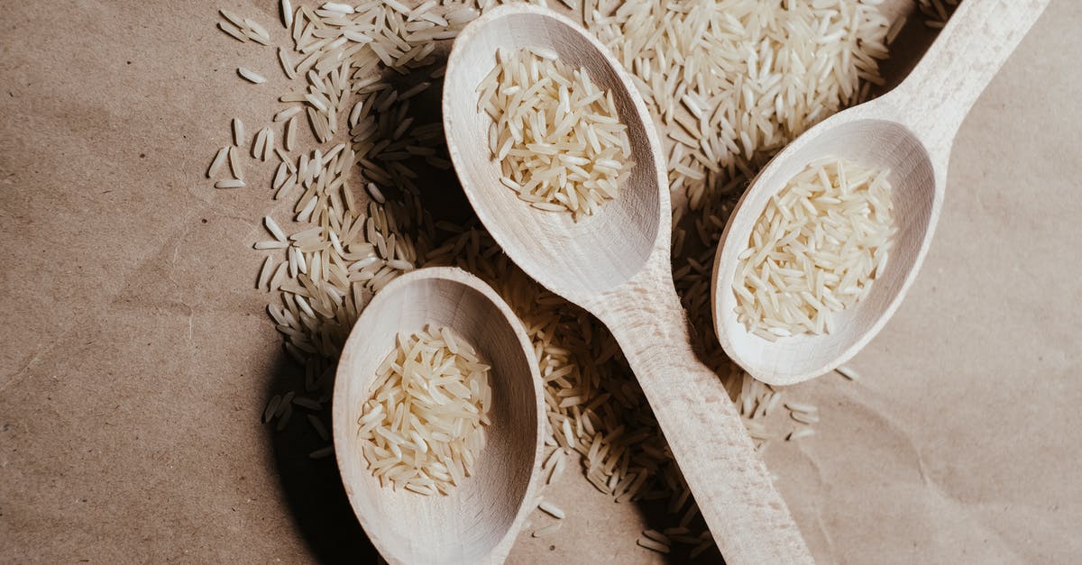 Can I carry homeopathic medicines and uncooked rice to Germany? - A White Rice on a Wooden Spoons