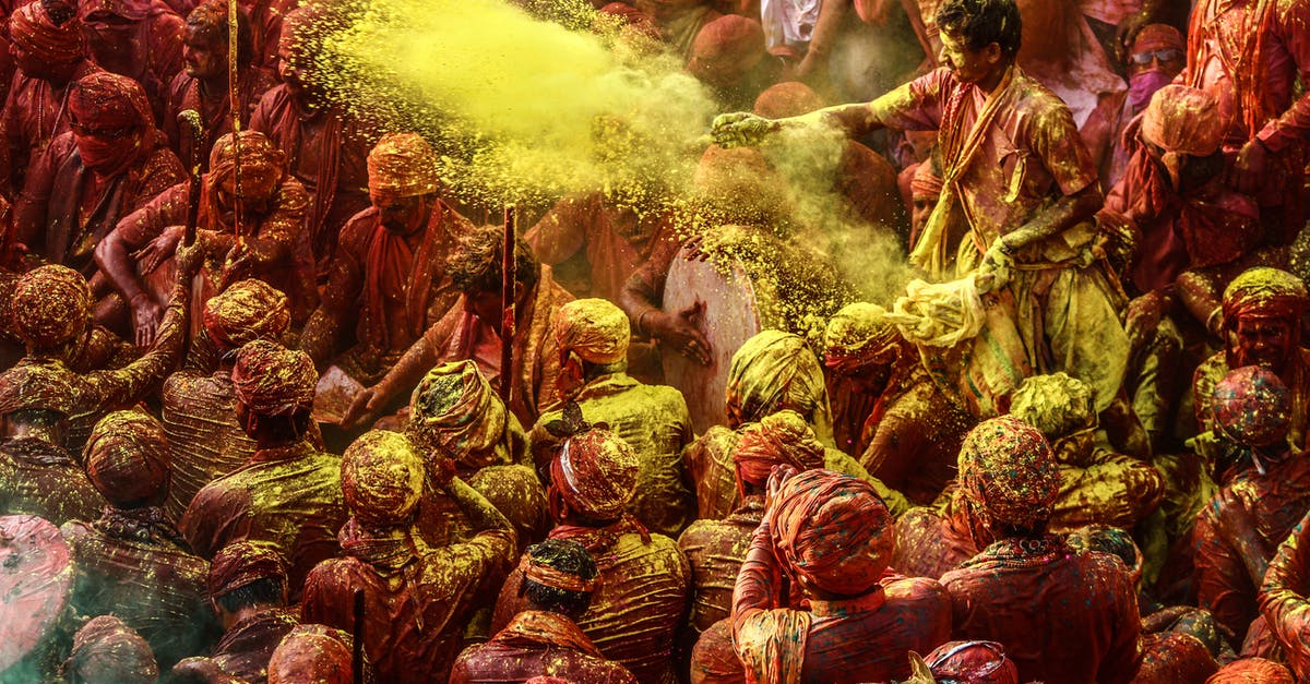 Can I carry Whey protein powder to India? - Crowd of People Covered in Paint