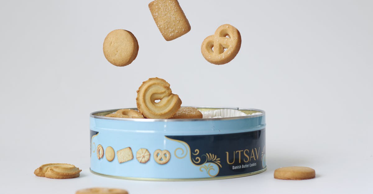 Can I check in early, including my bags, when flying British Airways from Singapore? - A Product Photography of a Box of Danish Butter Cookies