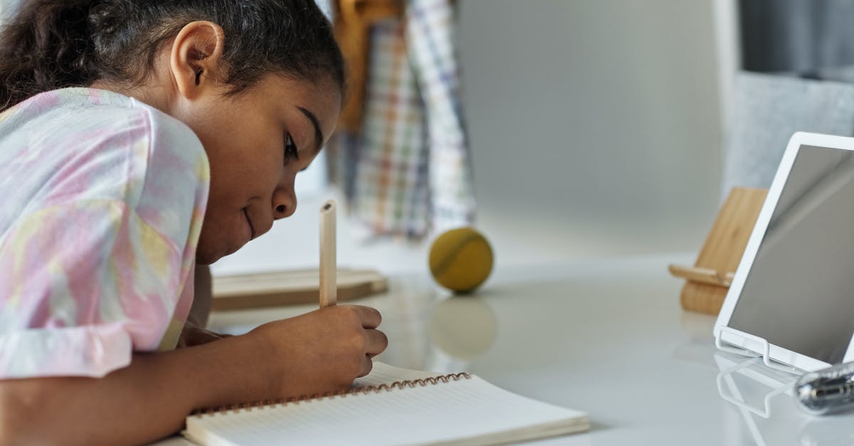 Can I determine upgrade eligibility if I know the fare class? - Photo of Girl Writing on White Paper