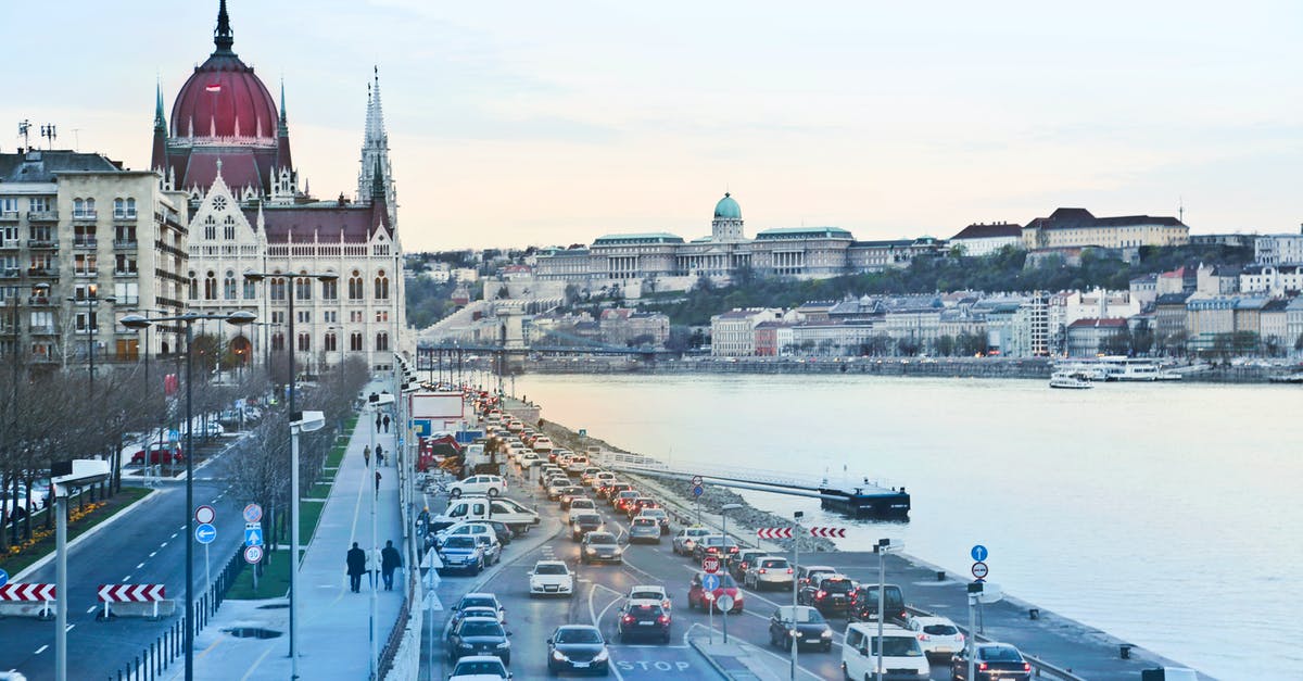 Can I drive in Europe after passing test on provisional license - Traffic Jam Along River Bank