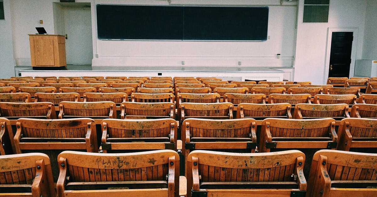 Can I enter the UK with short term study visa even though my course is over? - Brown and Black Wooden Chairs Inside Room