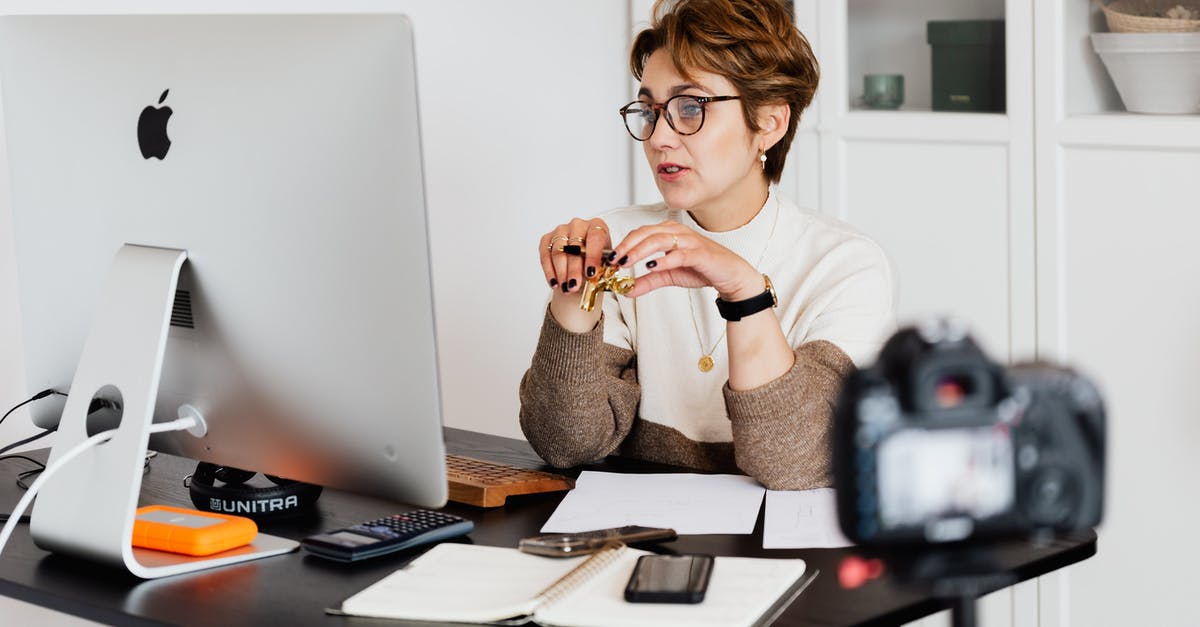 Can I enter the UK with short term study visa even though my course is over? - Confident elegant lady in eyeglasses hosting webinar