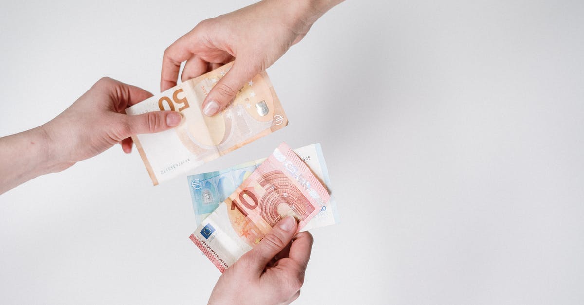 Can I exchange Euro notes to DKK in Copenhagen (airport)? - Person Holding 10 and 10 Euro Banknotes