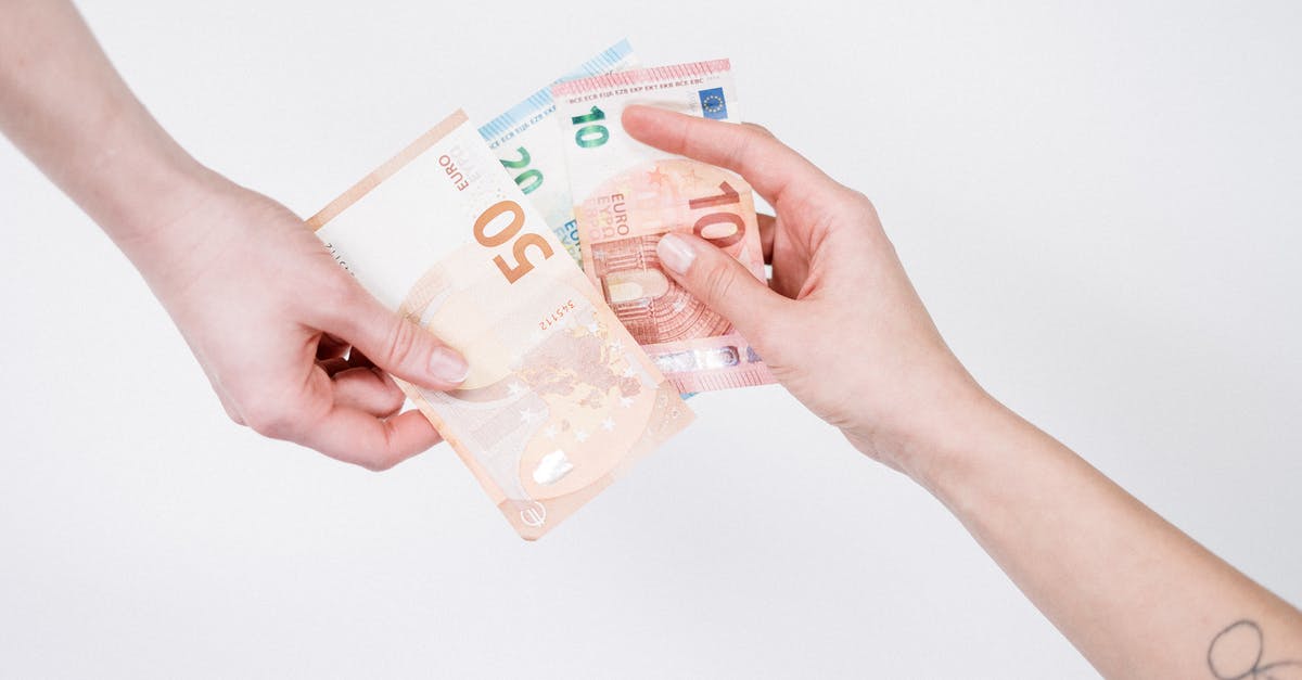 Can I exchange Euro notes to DKK in Copenhagen (airport)? - Person Holding 10 Euro Bill