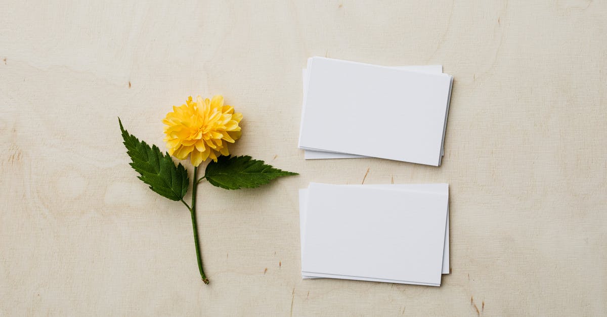 Can I get a NEXUS card with no intention of regularly traveling to or from Canada? - Blank mockup business cards and yellow flower on desk