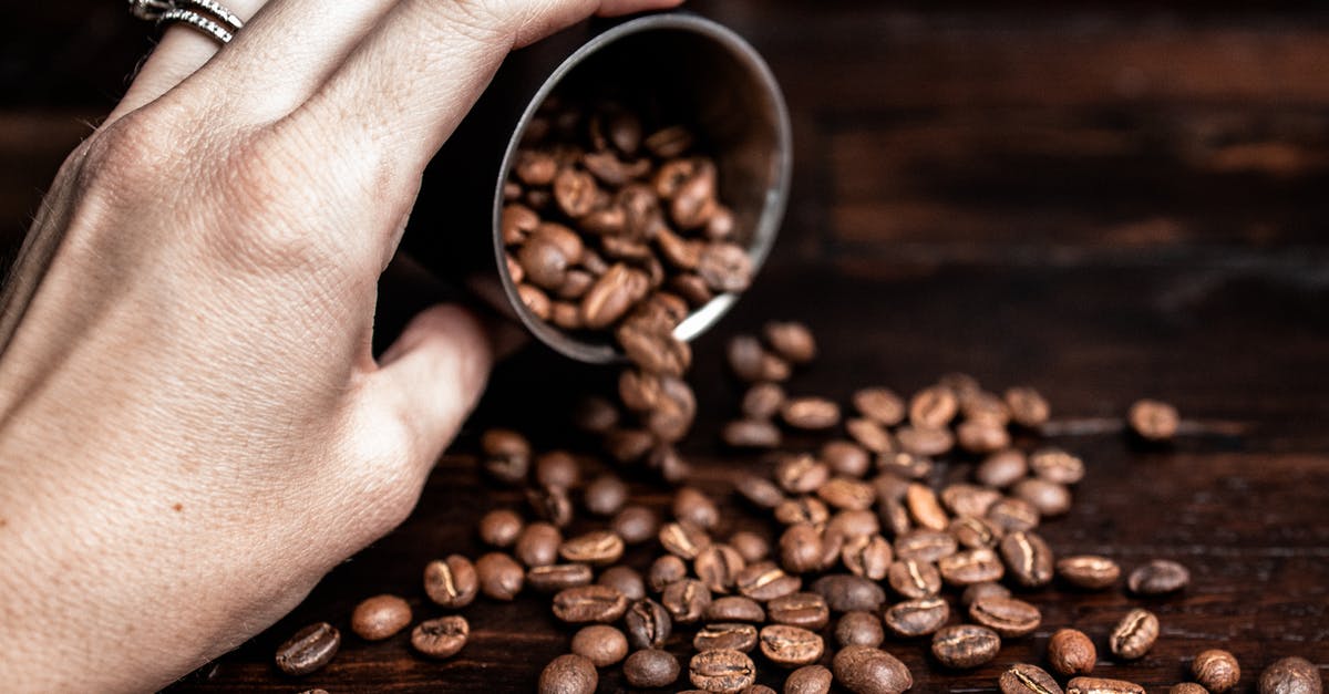 Can I have a Geiger counter in my hand luggage? - Woman pouring coffee beans on table