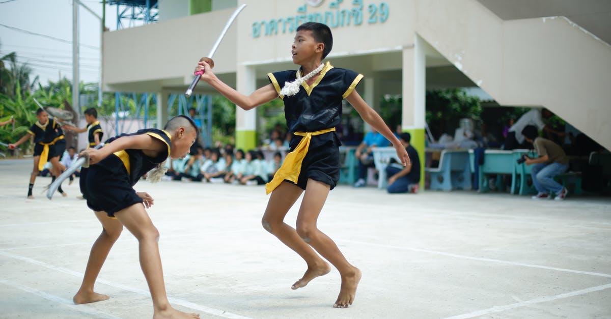 Can I have a sword fight in Scotland? - Photo of Boys Sparring With Sword