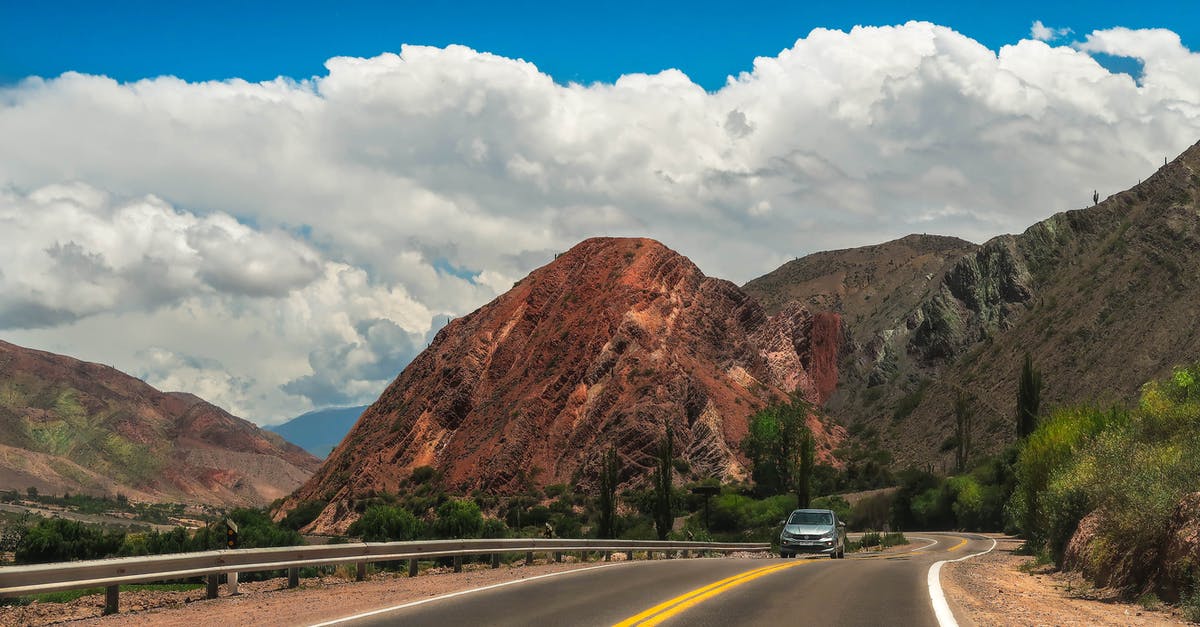 Can I interrupt a journey with an NSB ordinær togbillett? - Car Driving Highway in Mountain Landscape