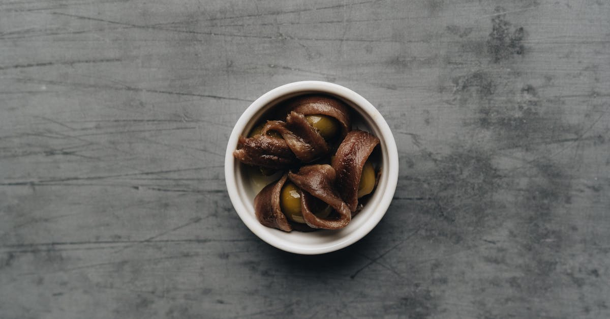 Can I pay with HKD in Macau or Shenzhen? - Brown Coffee Beans in White Ceramic Mug