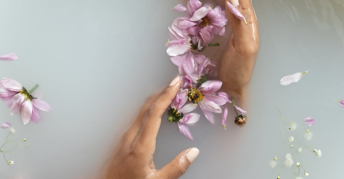 Can I take orthodontic wires in my hand luggage? - Woman holding flowers in hands in water