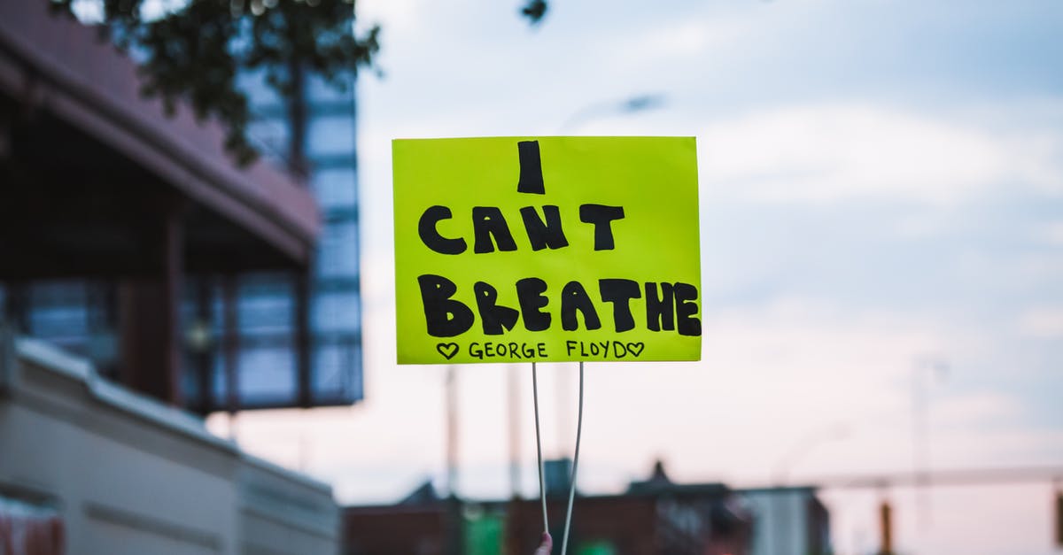 Can I transit Bolivia, by bus, if I don't have visa? - Crop faceless person showing paper with i can t breath inscription during Black Lives Matter movement demonstration