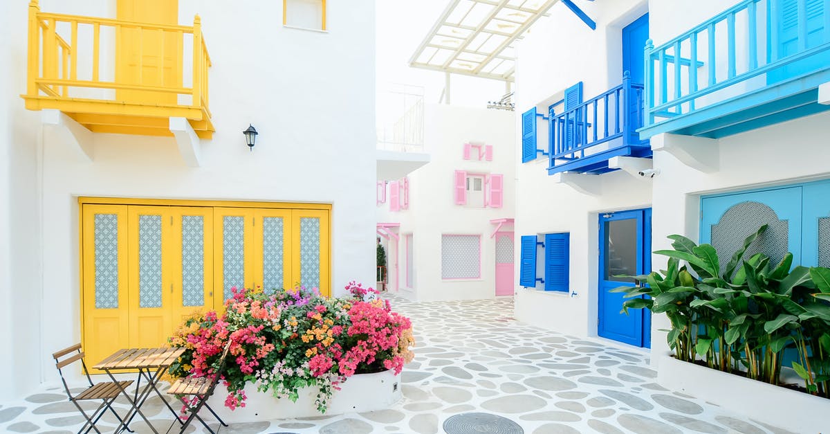 Can I travel to Greece using my French visa? [duplicate] - Architectural Photography of Three Pink, Blue, and Yellow Buildings