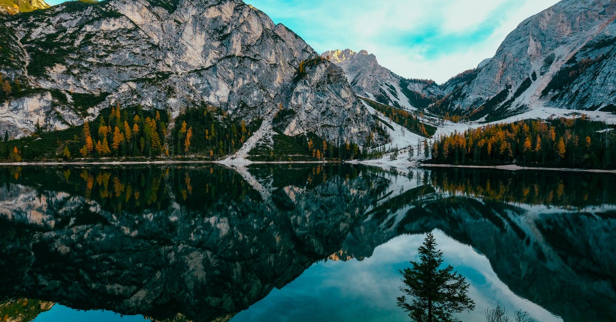 Can I travel to Italy on UK-issued refugee document? [duplicate] - Reflection of Mountain on Lake Braies