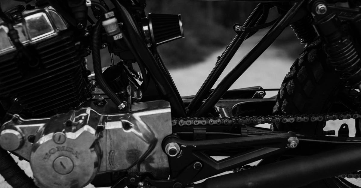 Can I travel to the northern part of Cyprus? - Black and white of old vintage motorbike wheel and units of engine and gearbox