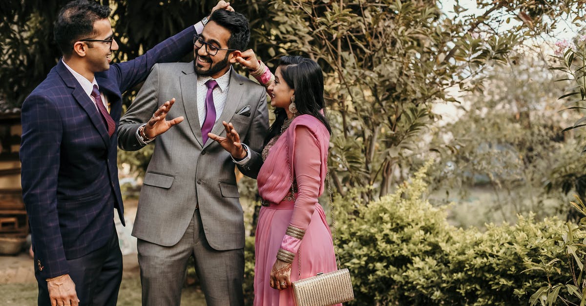 Can my brother photograph my wedding as a tourist? - A Groom Having Fun with His Siblings