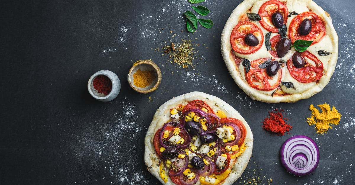 Can one export spices and teff flour from Ethiopia? - Pizza with vegetables surrounded with flour and condiment