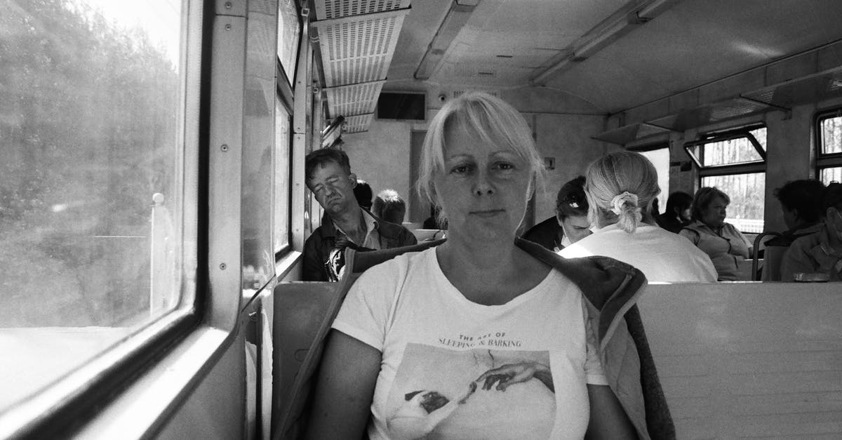 Can passengers visit the flight attendants' sleeping quarters? - Grayscale Photography of Woman in Crew Neck Shirt Sitting on the Bus