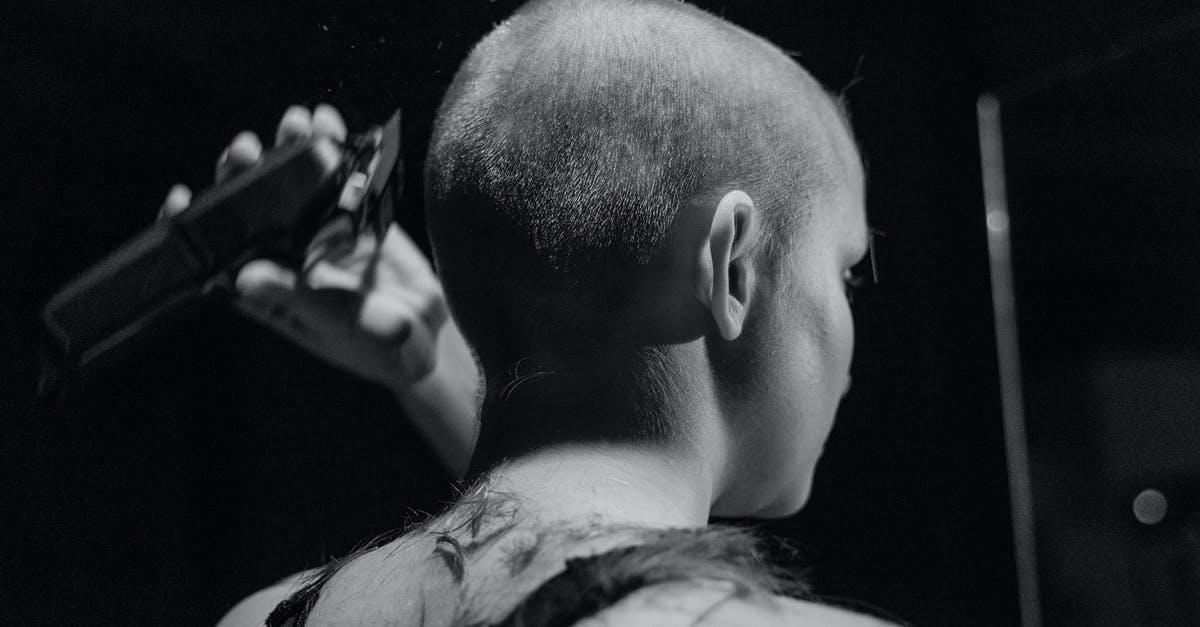 Can shaving my head cause problems entering the US? - A Woman Shaving Her Head