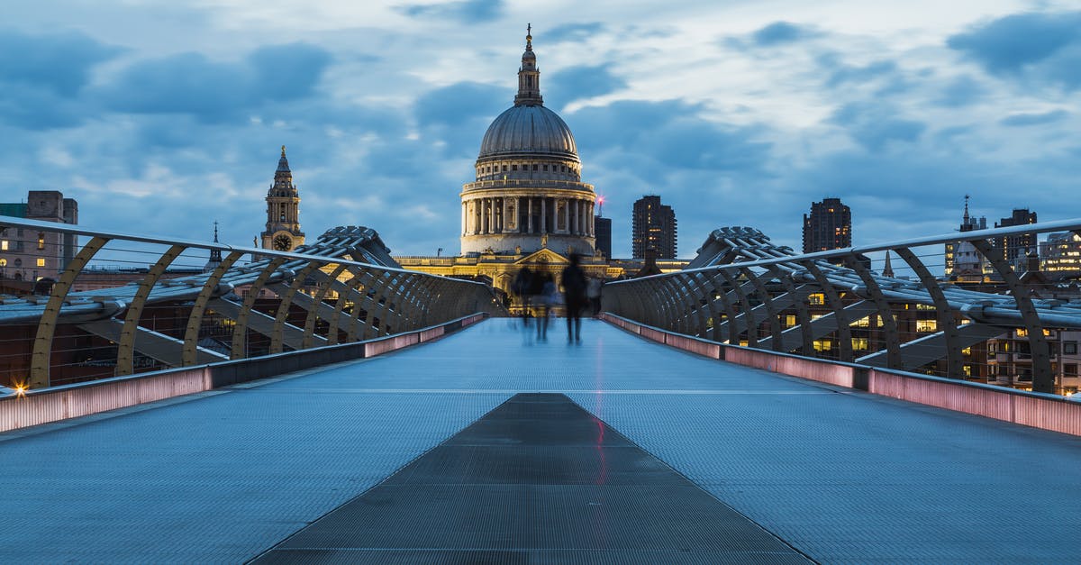 Can we enter the UK with Blue Cards issued by Romania? - People Crossing Millenium Bridge