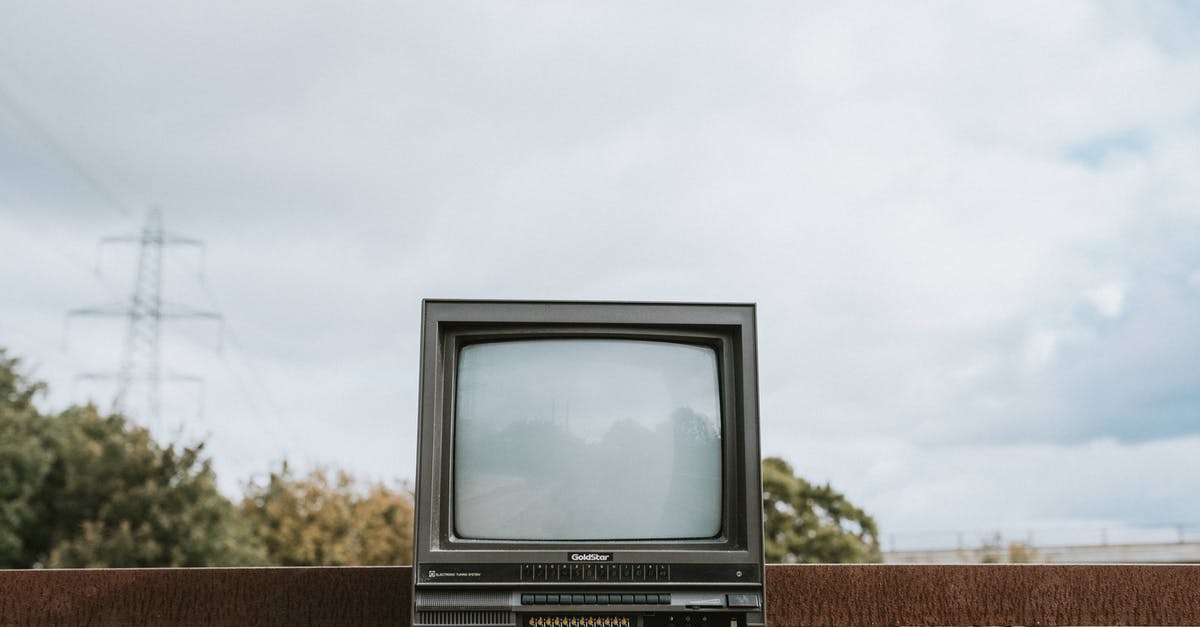 Can you bring a used TV into Nepal? [closed] - Retro TV set placed on stone surface