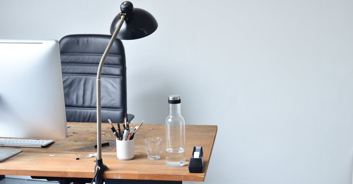 Can you bring an empty water bottle with you on the plane? - Modern minimalistic workplace in light room