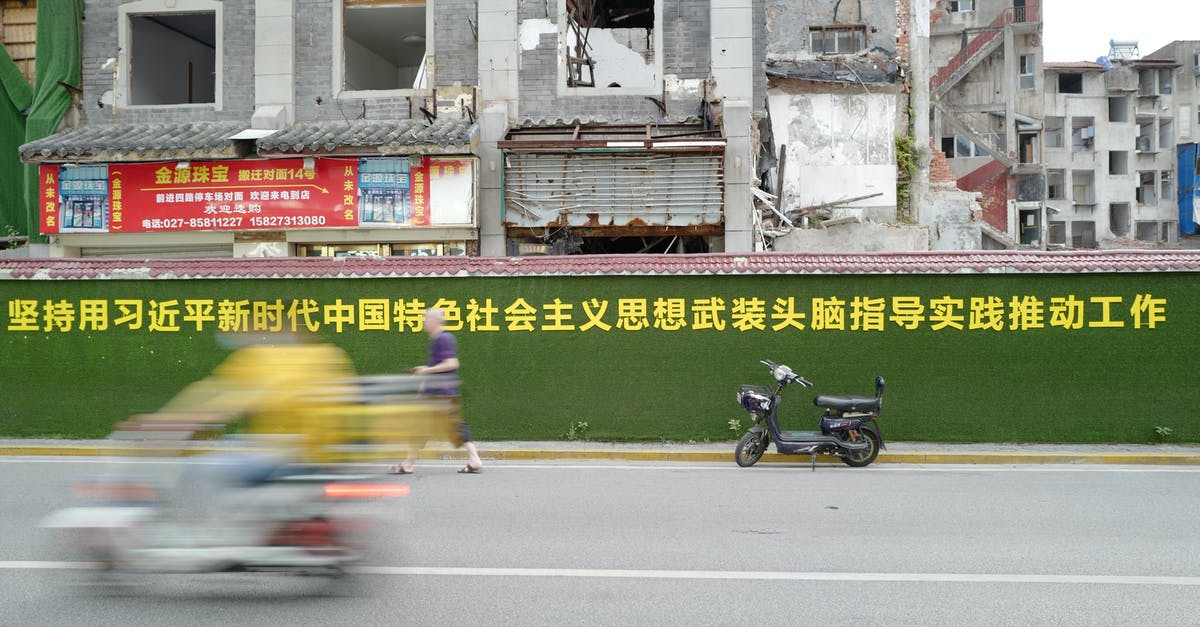 Can you bring your scooter on TER trains? - Ruins of Building in City