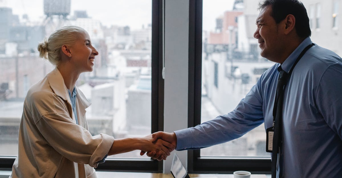 Can you escape a contract if an airline maltreated its other customers? - Cheerful colleagues shaking hands while standing at table Can you escape a contract if an airline maltreated its other customers? - Cheerful colleagues shaking hands while standing at table
