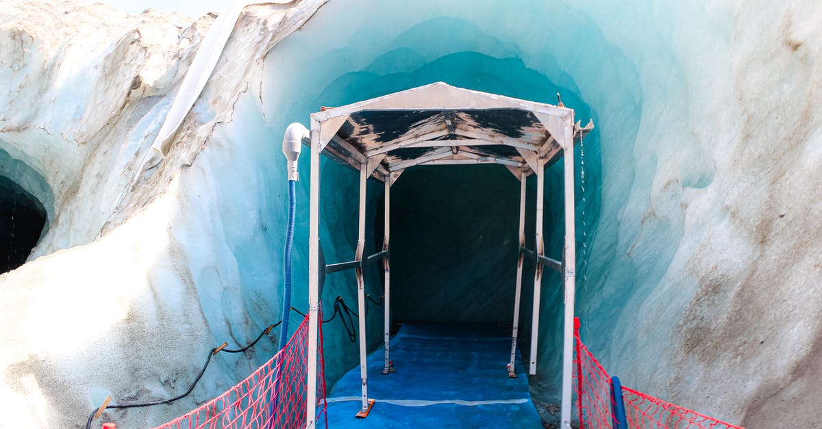 Can you freeze liquids to pass security checks? - Walkway to go through glacier in cold terrain