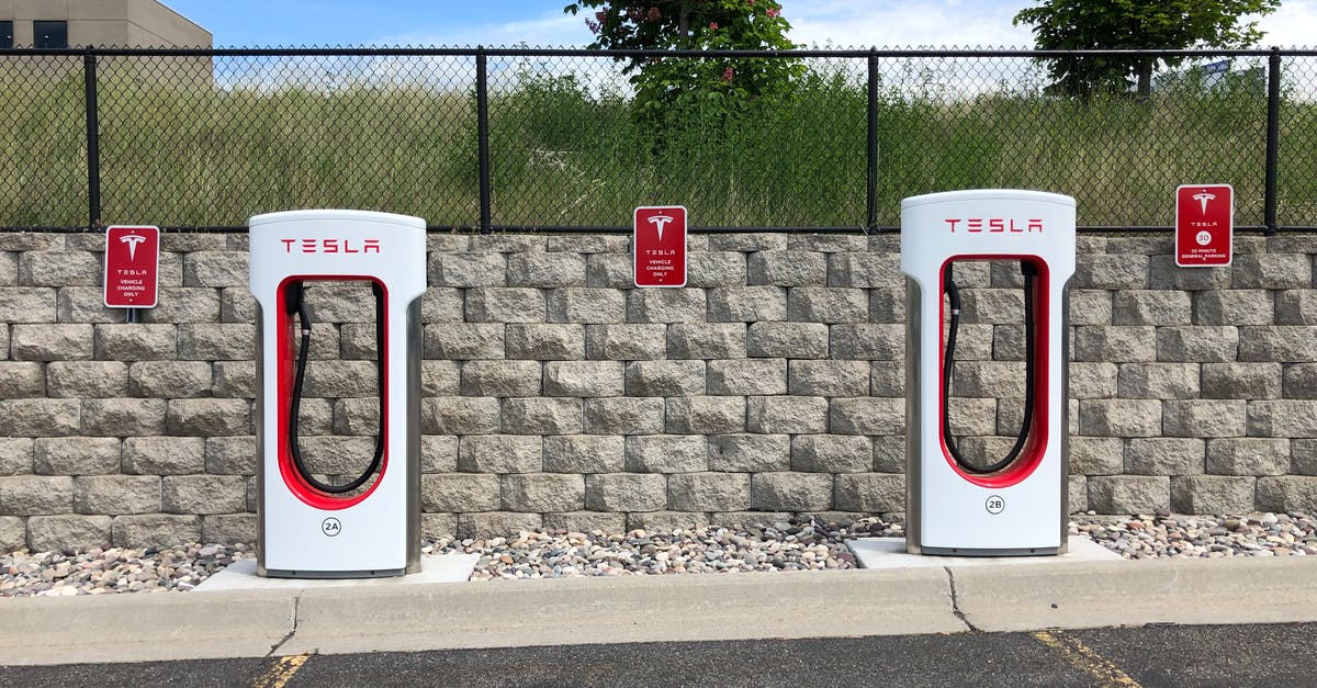 Can you get to South West Rocks by public transport? - Two White and Red Tesla Charging Station