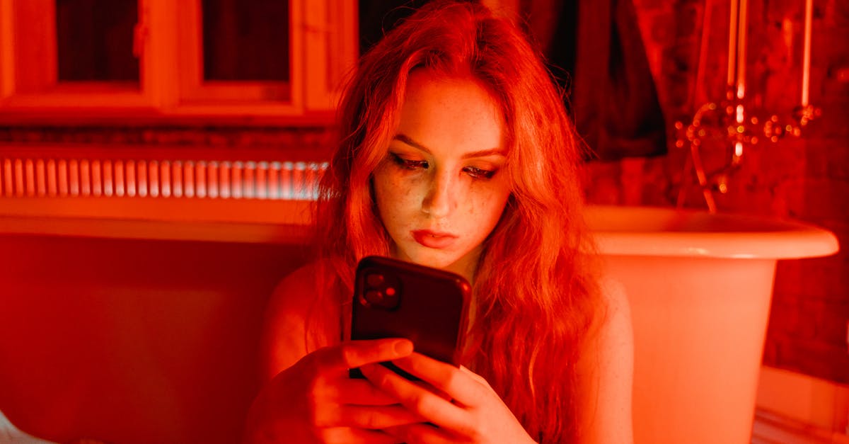 Can you use your mobile phone in the Channel Tunnel? - Woman with Smudge on Face Holding Cellphone