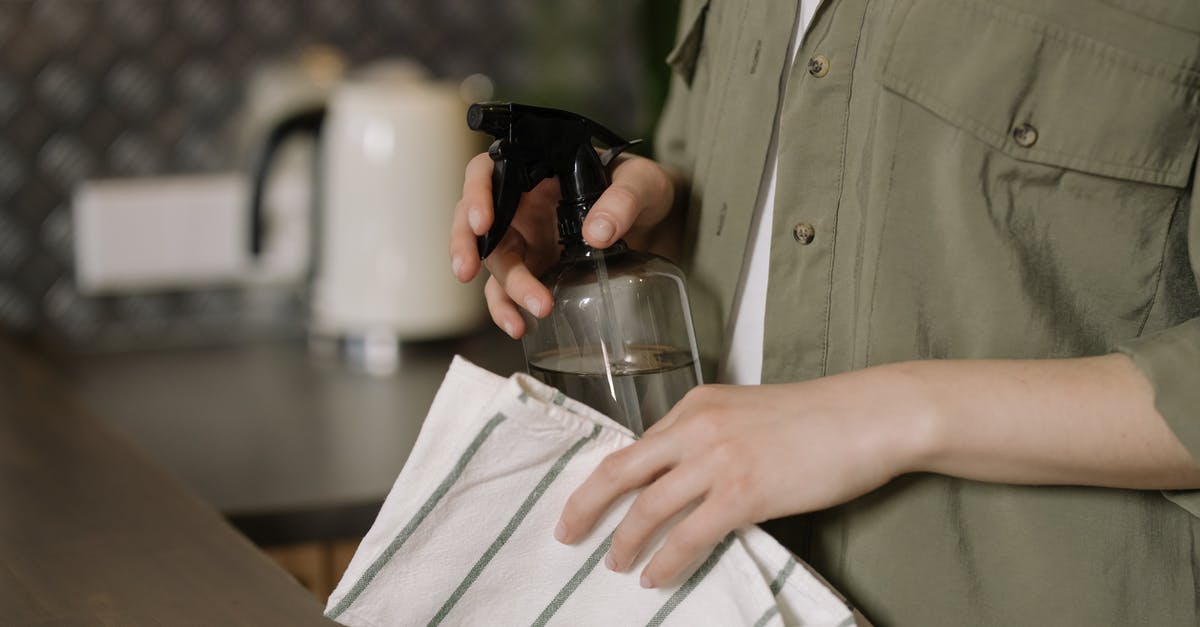 Can you wash an inner tent in the washing machine? [closed] - Person in Green Button Up Shirt Holding Clear Drinking Glass