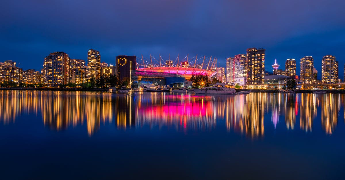 Canada eTA eligibility requirements? - Long exposure panoramic shot from colorful downtown Vancouver at night