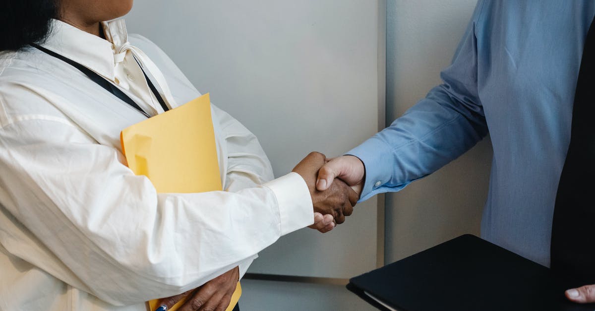 Canada TRV for conference (mexico visa rejection in the past) - Diverse coworkers shaking hands after meeting