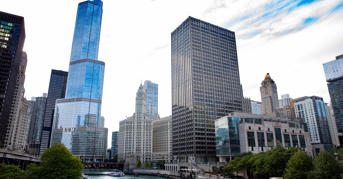 Canadian eTA with US visa - High Rise Buildings Near Body of Water Under Blue Sky