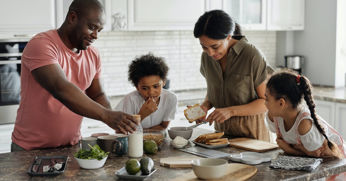 Canadian parents 8 month stay in USA - Family Making Breakfast in the Kitchen