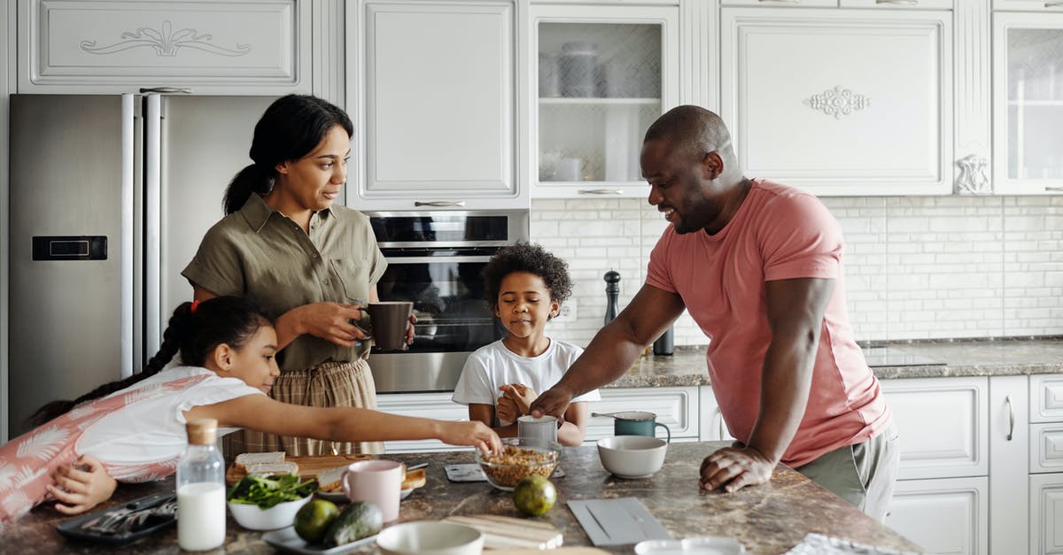 Canadian parents 8 month stay in USA - Family Making Breakfast in the Kitchen