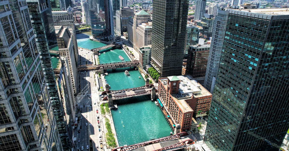 Canadian wants to go to US for meetings - Chicago River Aerial 