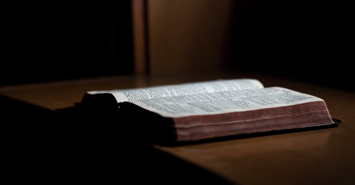 Cancelation fee on a unsuccessfully booked room - Close-up of Paper Against Black Background