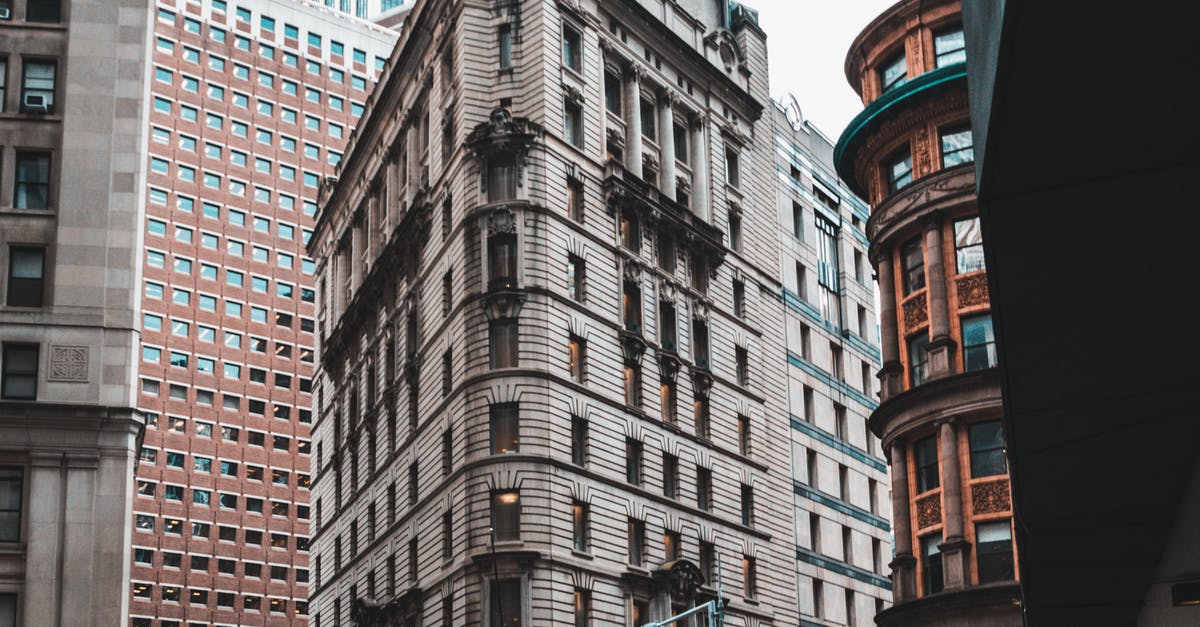 Capsule hotels in New-York JFK - Low-angle View of White Concrete Building