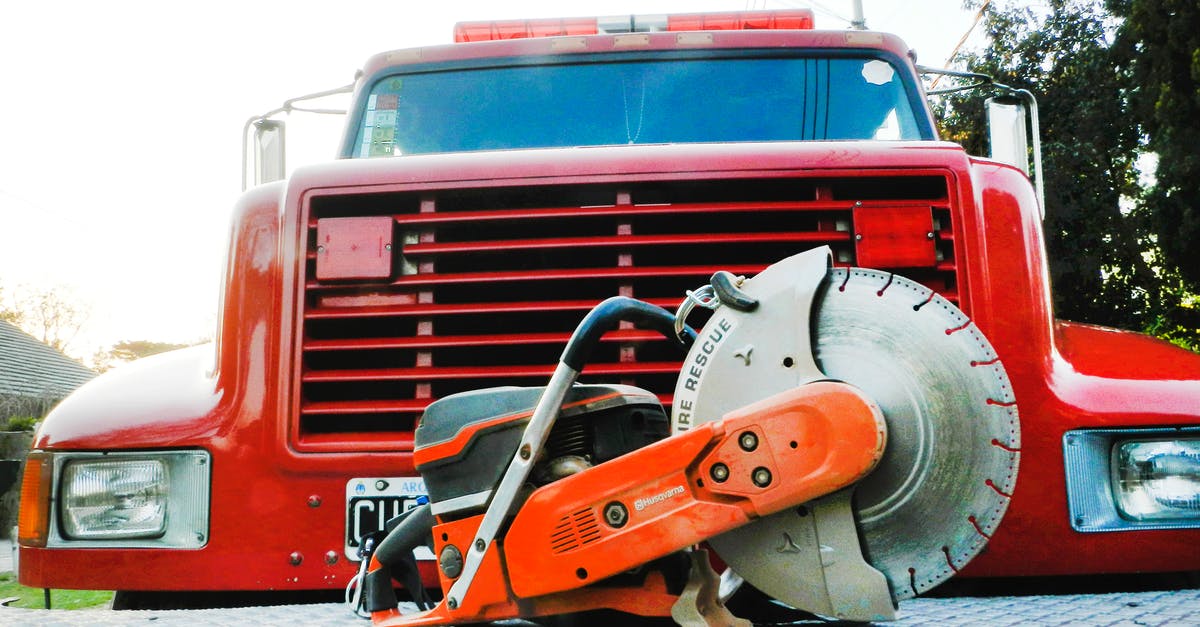 Car hire in Austria with ski equipment - Red Vintage Truck on Snow Covered Ground