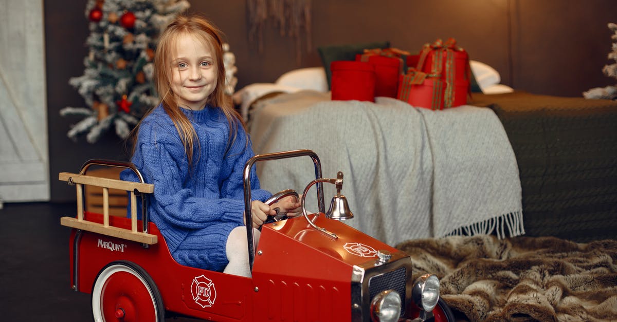 Car on ferry between Gozo and Malta during the Christmas period - Portrait of Girl Sitting in Retro Car