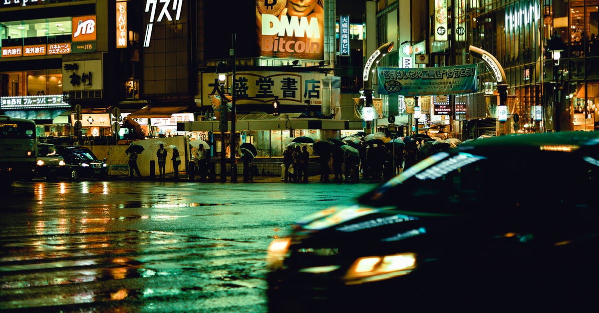 Car rental in Japan - Black Vehicle during Nighttime Photo