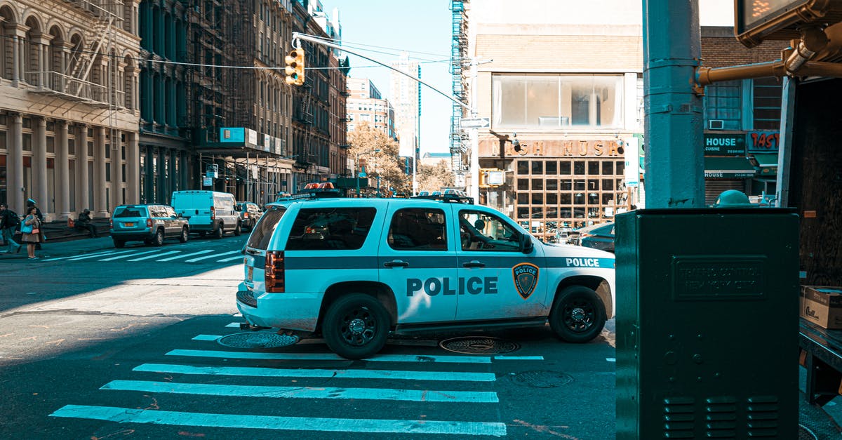 Car rentals cross-border between USA & Canada - White Police Car