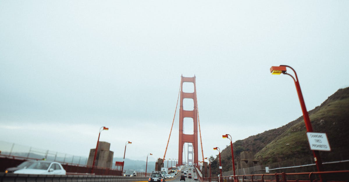 Car rentals cross-border between USA & Canada - Majestic suspension bridge with moving cars