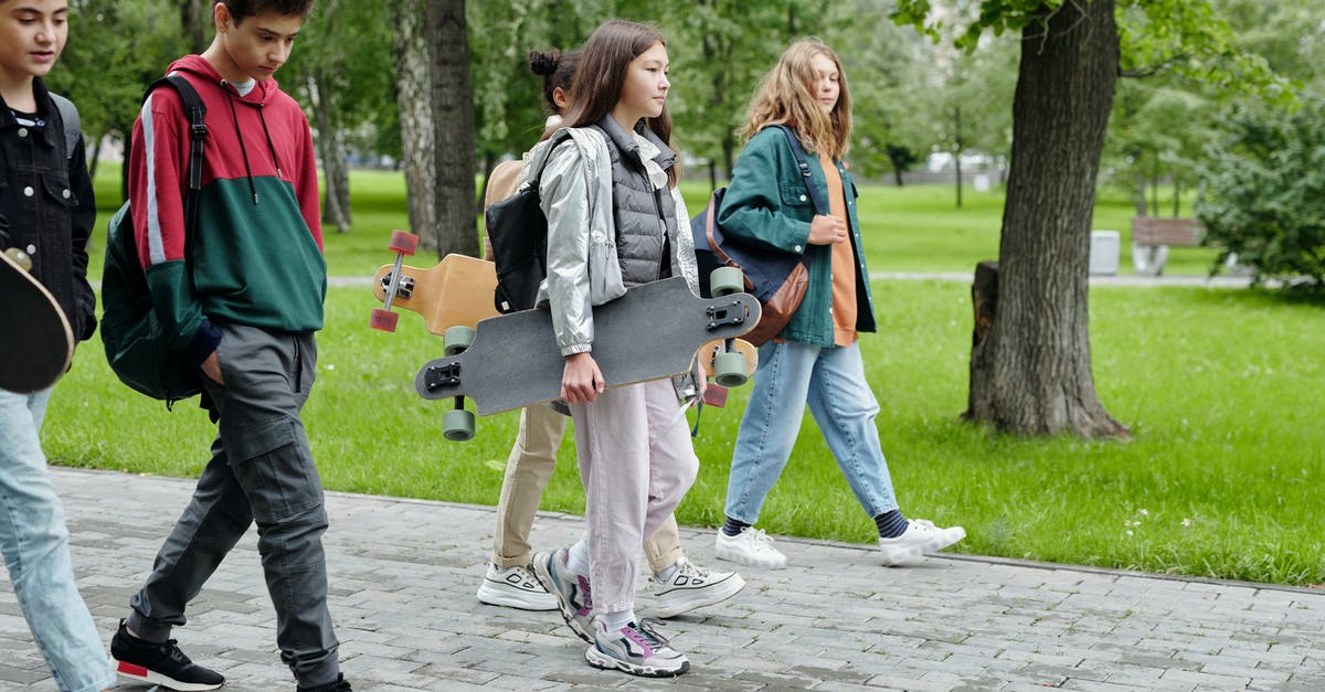 Carrying a longboard on a Germanwings-Eurowings flight - A Girl Holding a Longboard