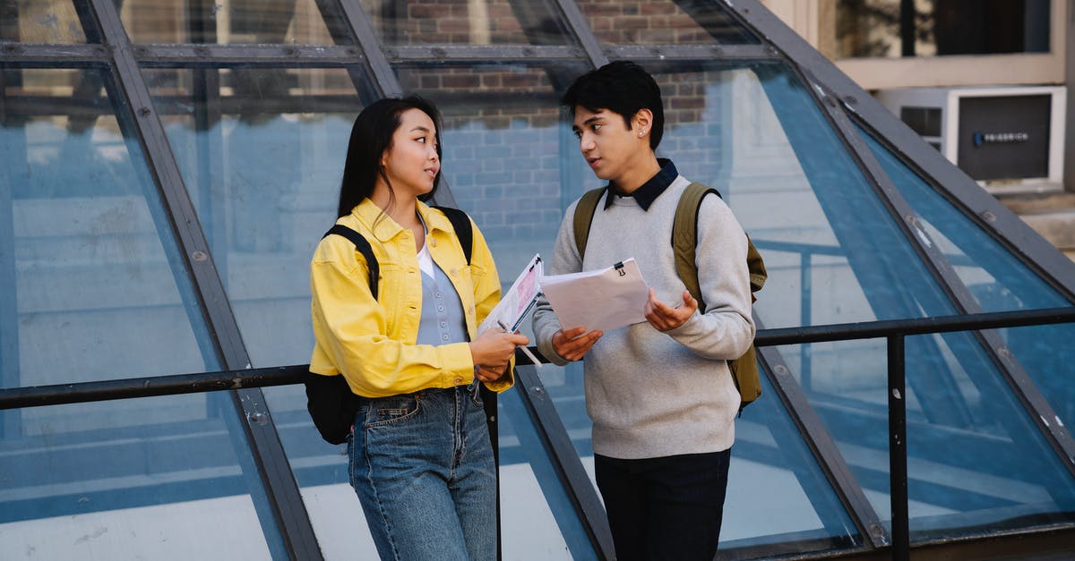 Carrying medicines internationally for a friend - Man Holding Papers While Talking to a Woman